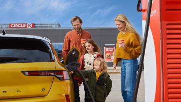 Family using EV charger