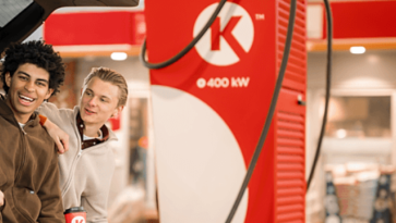 Boys using ev charger