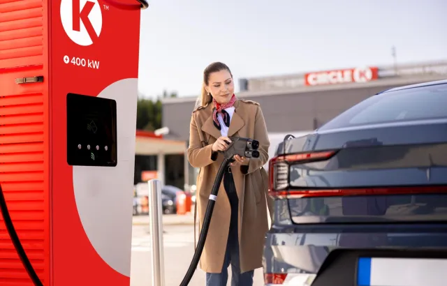 woman charging her car at a Circle K station